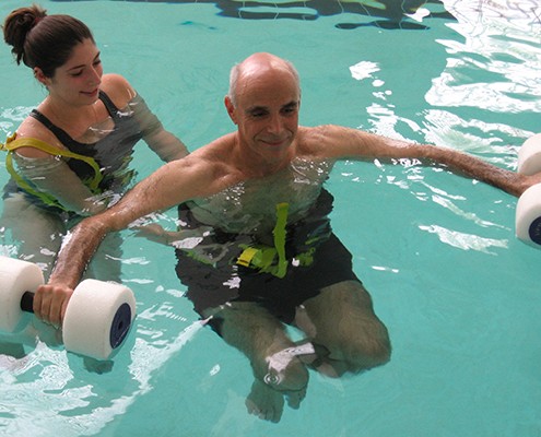 man receiving aquatic therapy