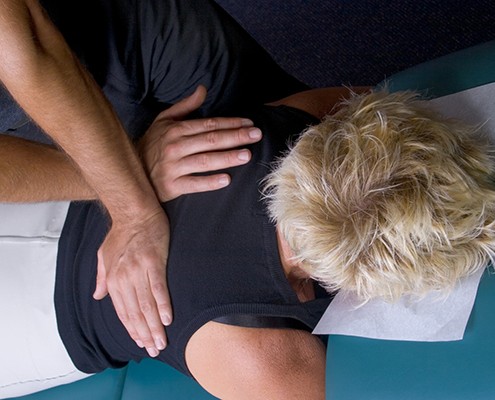 woman receiving physical therapy